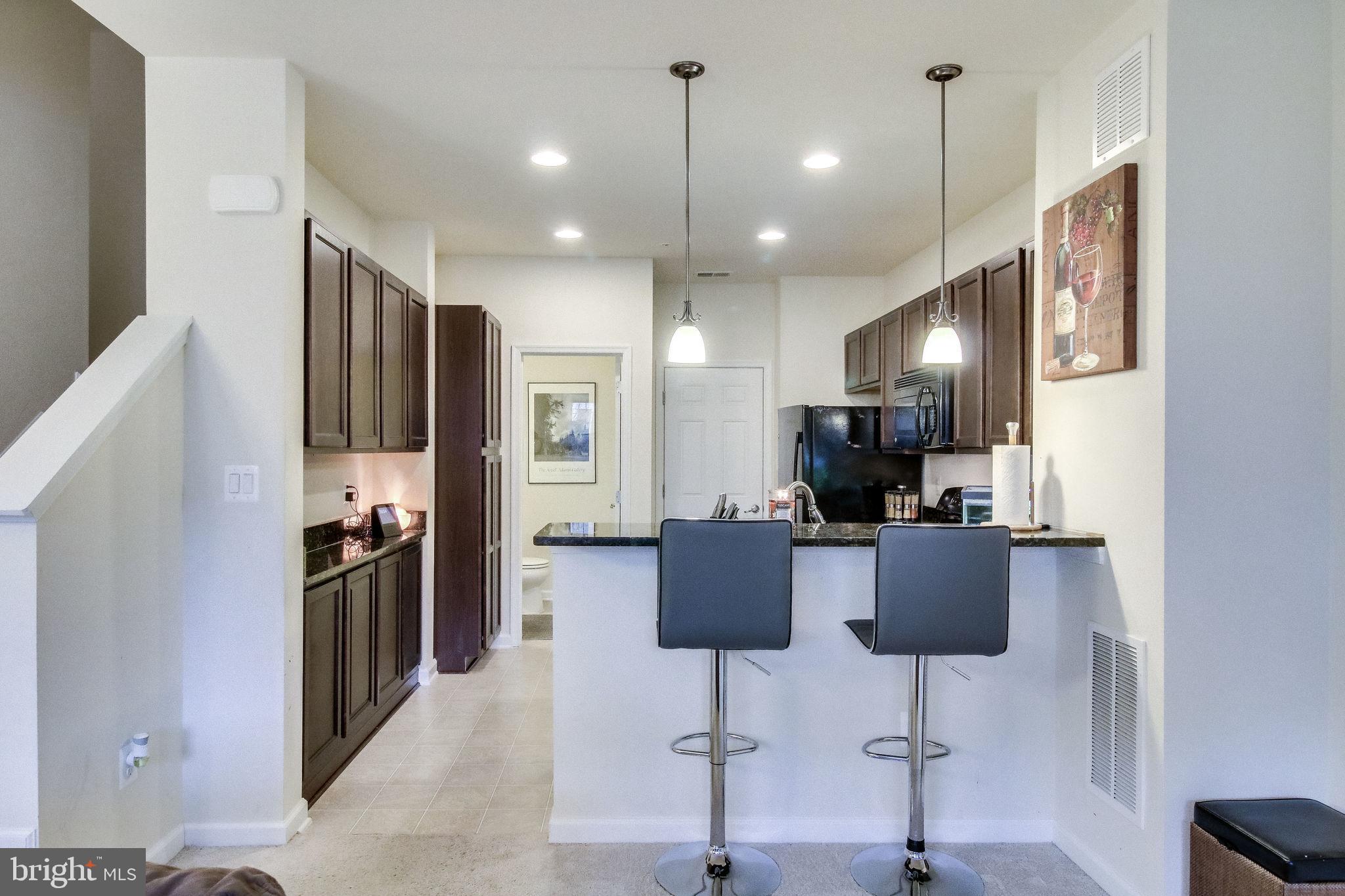 4847 Dane Ridge Circle, Unit 87 Woodbridge, VA 22193 - Photo 10 of 35 kitchen with sleek design elements.