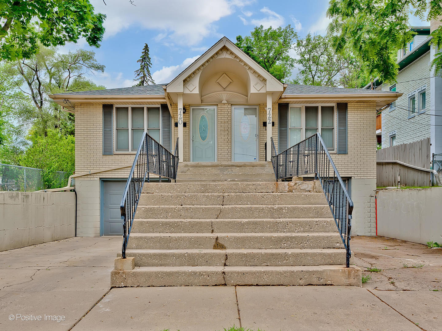 a front view of a house with a porch