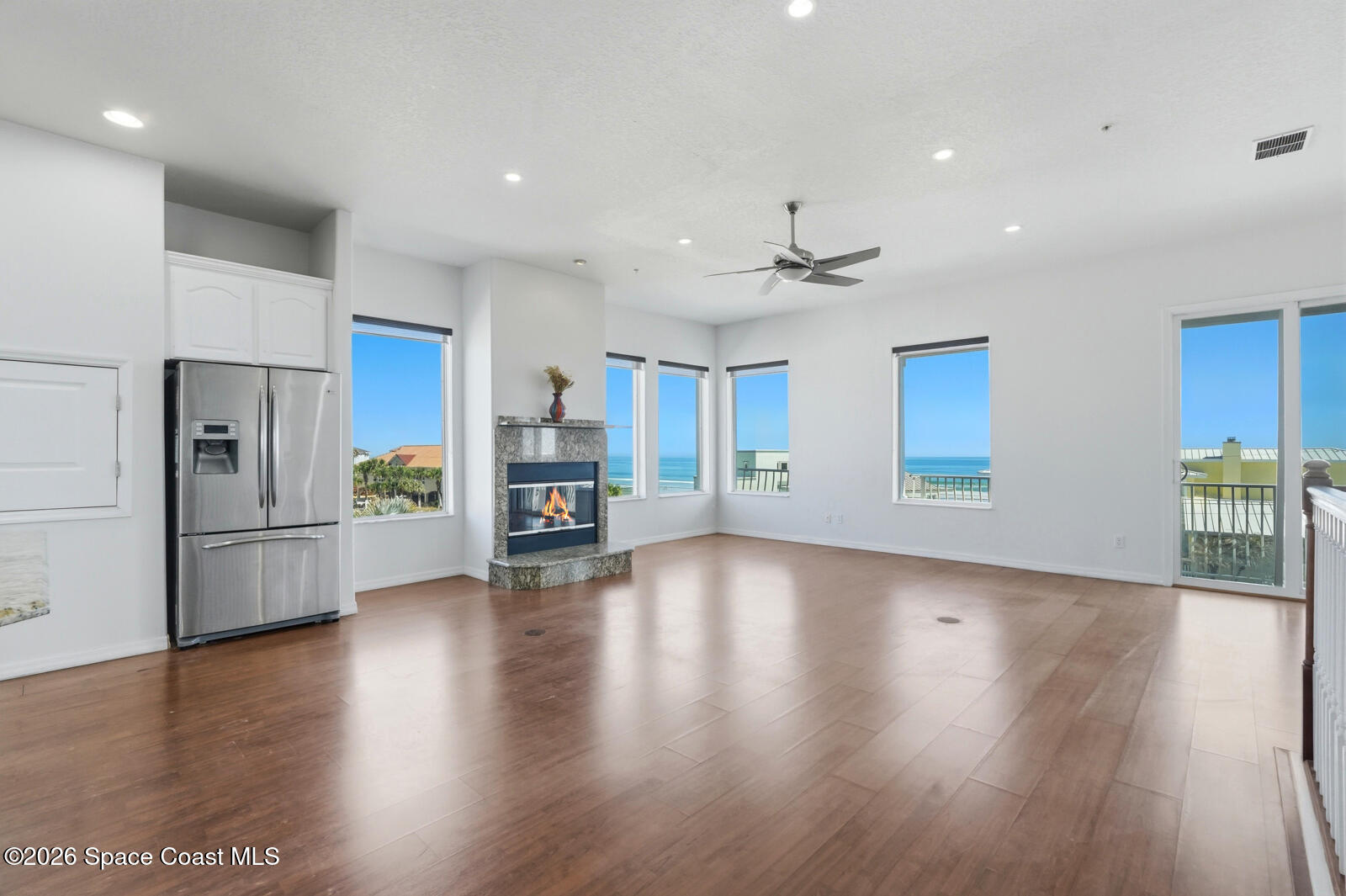 4688 South Atlantic Avenue Ponce Inlet, FL 32127 - Photo 12 of 83 a view of a kitchen with a sink and a refrigerator