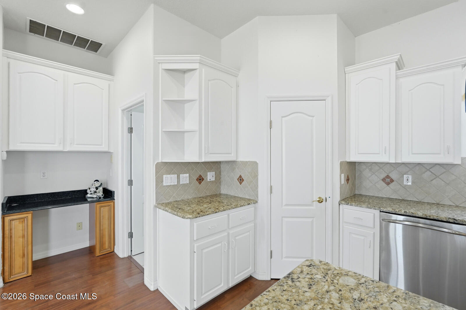 4688 South Atlantic Avenue Ponce Inlet, FL 32127 - Photo 19 of 83 a kitchen with stainless steel appliances granite countertop a refrigerator and a stove