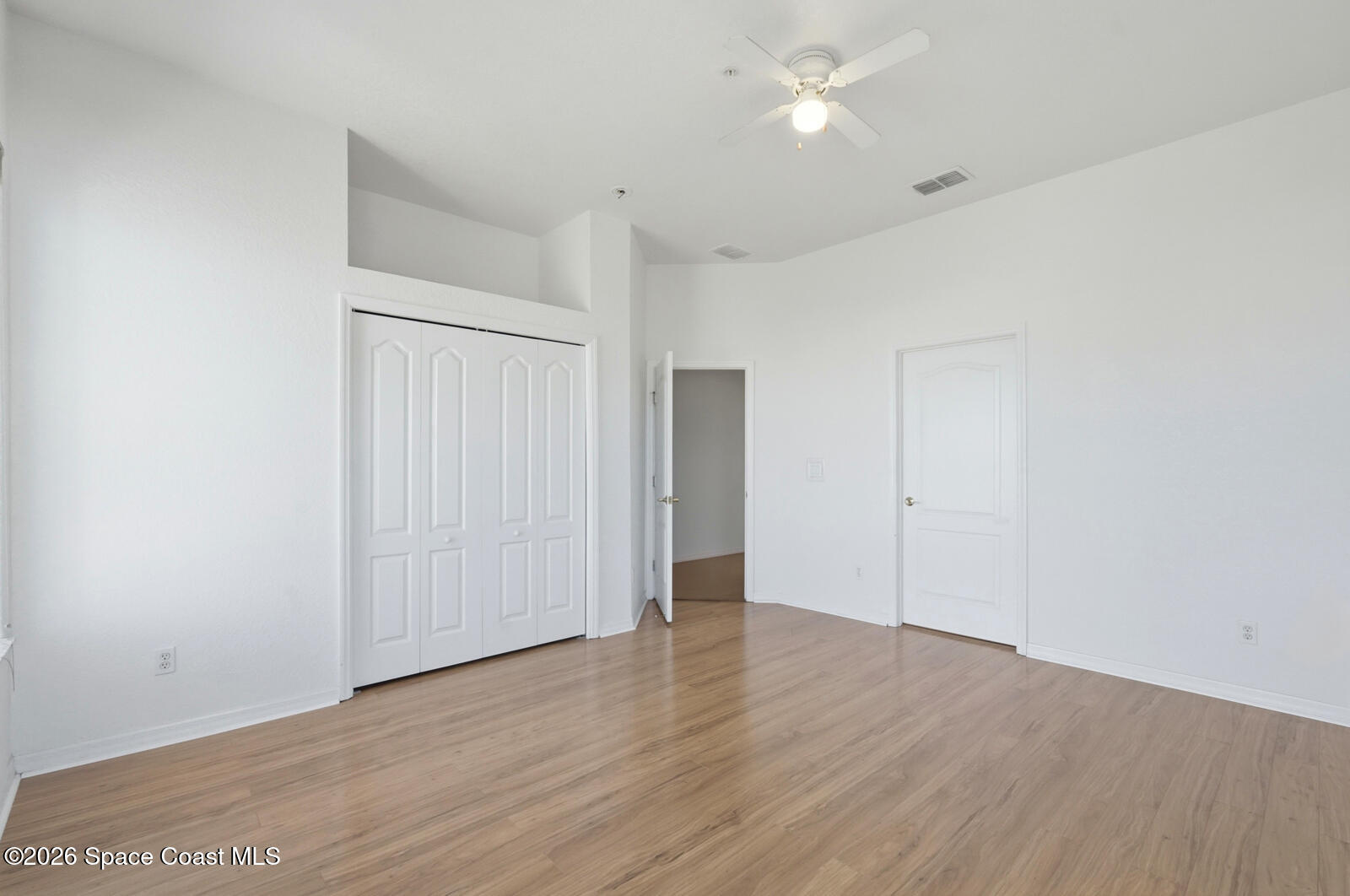 4688 South Atlantic Avenue Ponce Inlet, FL 32127 - Photo 37 of 83 a view of an empty room with wooden floor