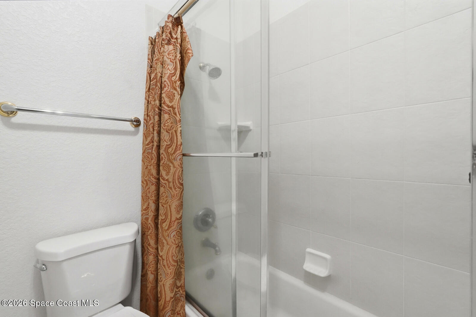 4688 South Atlantic Avenue Ponce Inlet, FL 32127 - Photo 39 of 83 a bathroom with a shower and a toilet