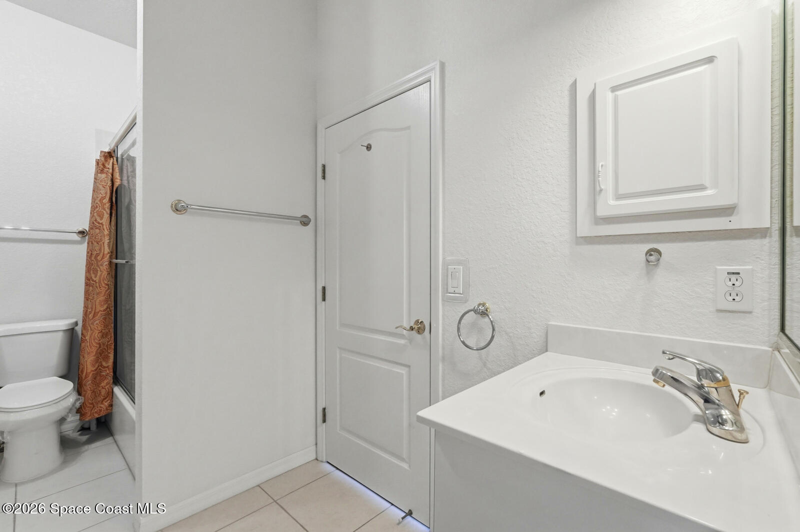 4688 South Atlantic Avenue Ponce Inlet, FL 32127 - Photo 40 of 83 a bathroom with a sink a toilet and shower