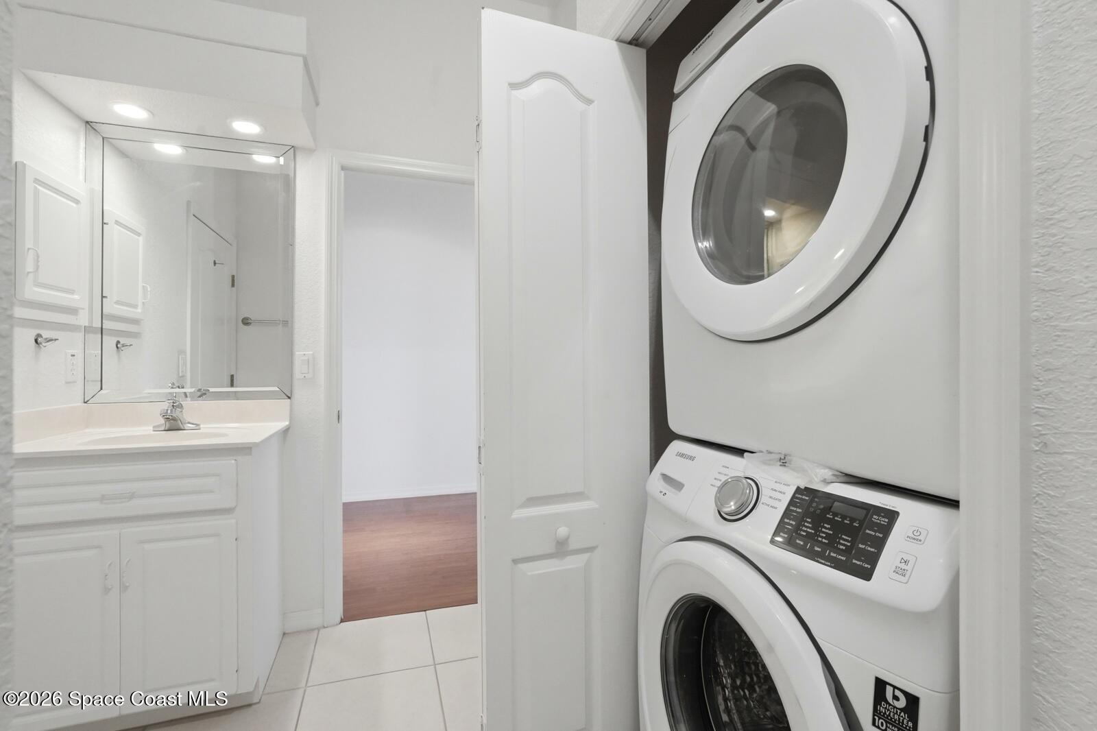 4688 South Atlantic Avenue Ponce Inlet, FL 32127 - Photo 41 of 83 a utility room with dryer and washer
