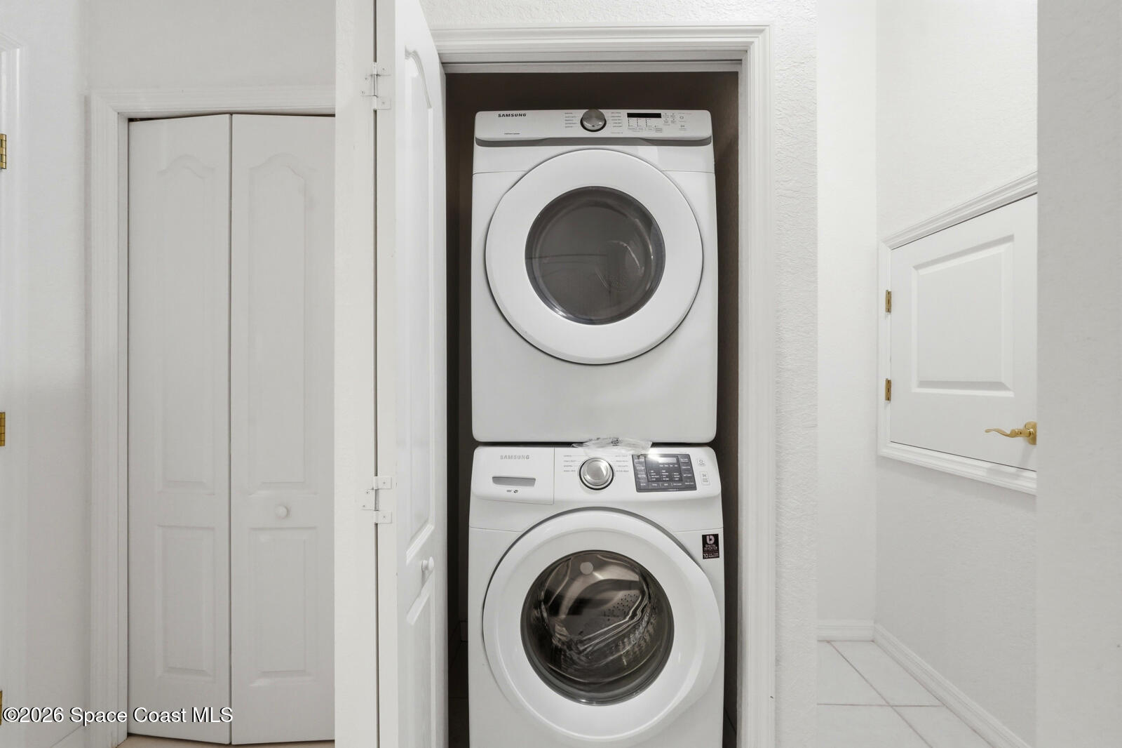 4688 South Atlantic Avenue Ponce Inlet, FL 32127 - Photo 42 of 83 a utility room with dryer and washer