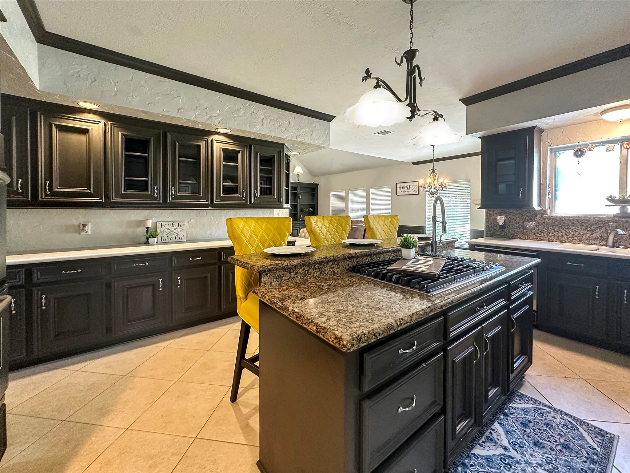 17003 Misty Creek Drive Spring, TX 77379 - Photo 13 of 50 A true chef’s delight, the kitchen features a large center island perfect for food prep, dining, or conversation.