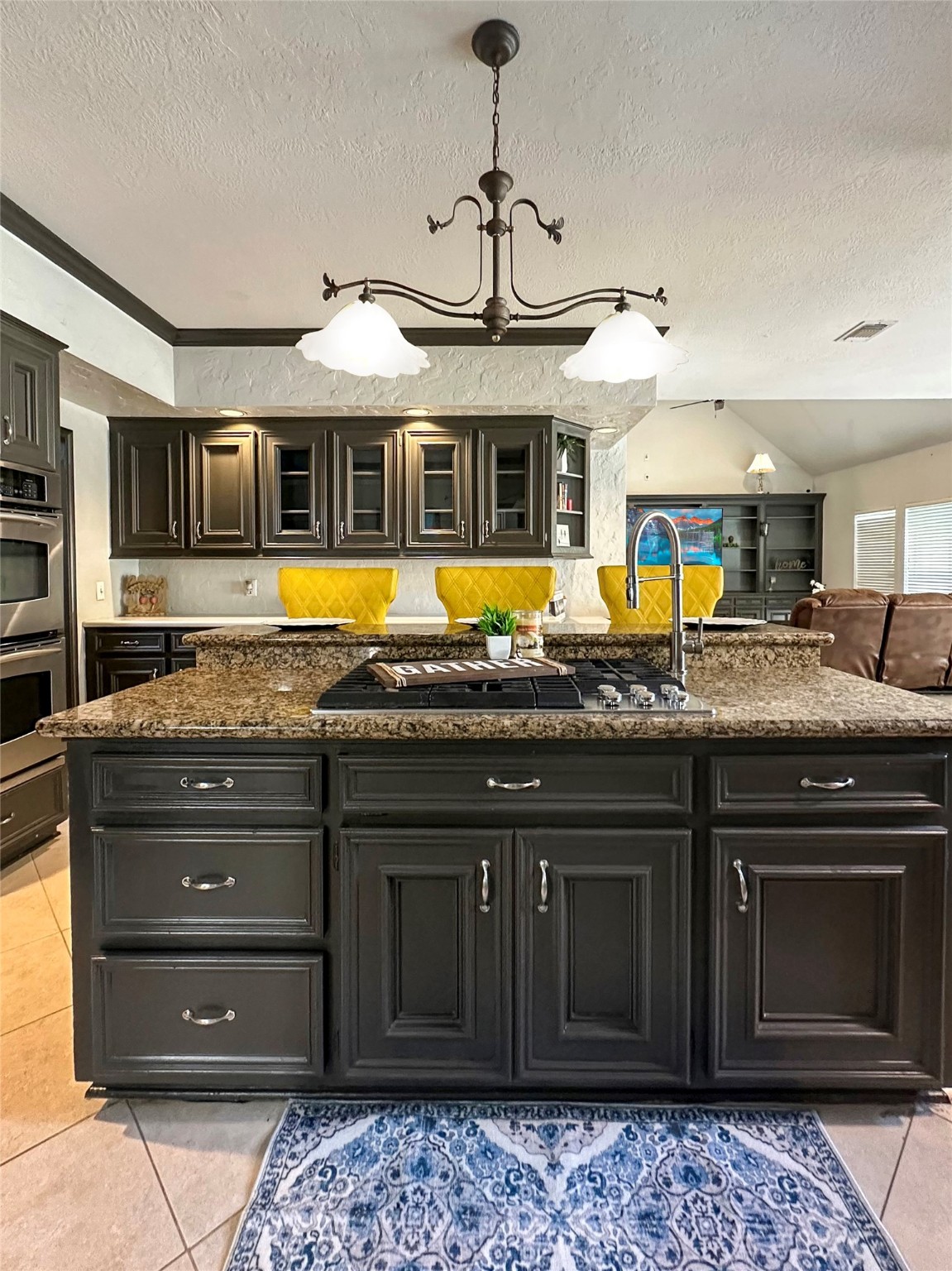 17003 Misty Creek Drive Spring, TX 77379 - Photo 16 of 50 a kitchen with a stove and a sink