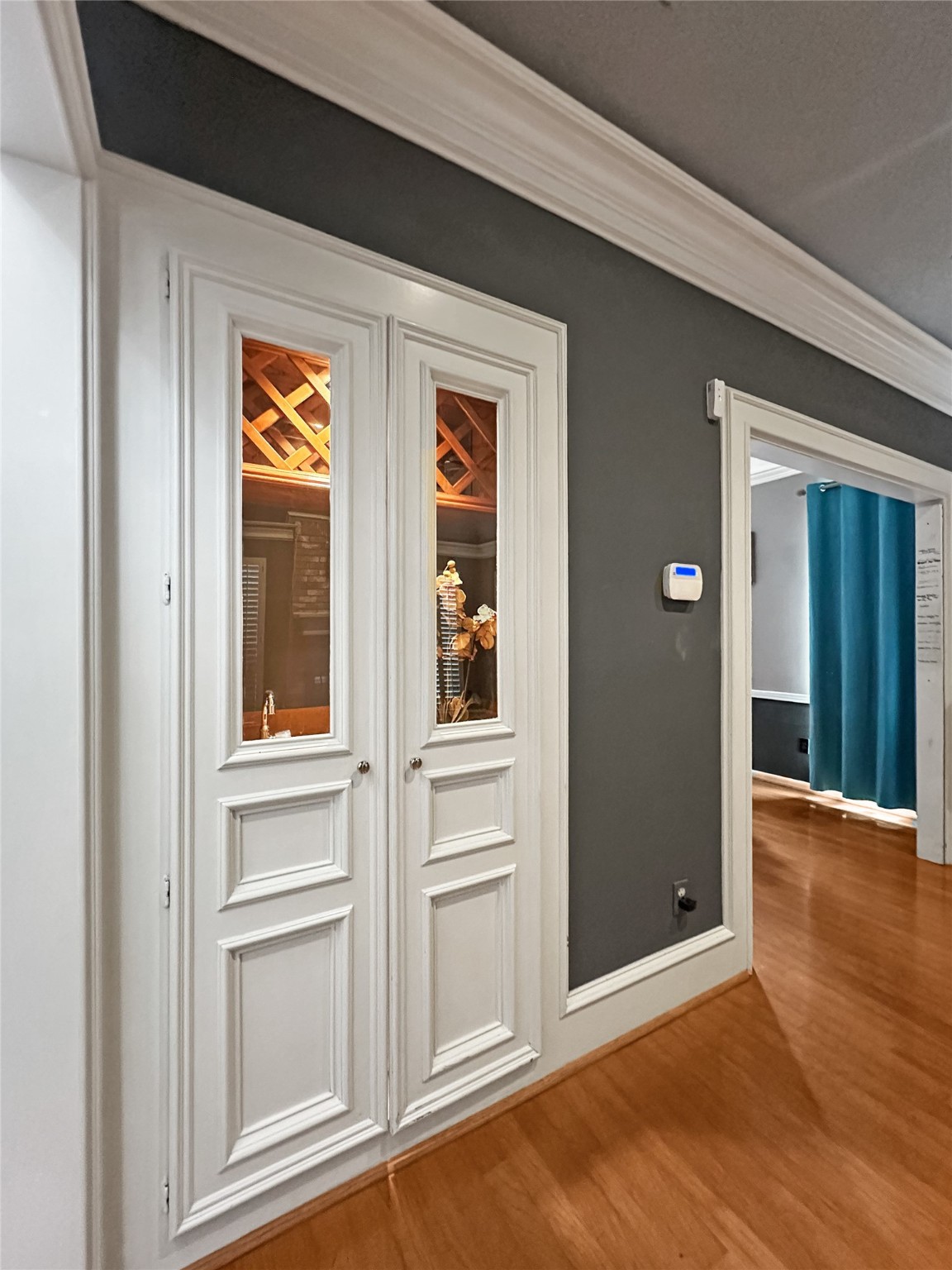 17003 Misty Creek Drive Spring, TX 77379 - Photo 21 of 50 a view of an empty room with wooden floor and closet