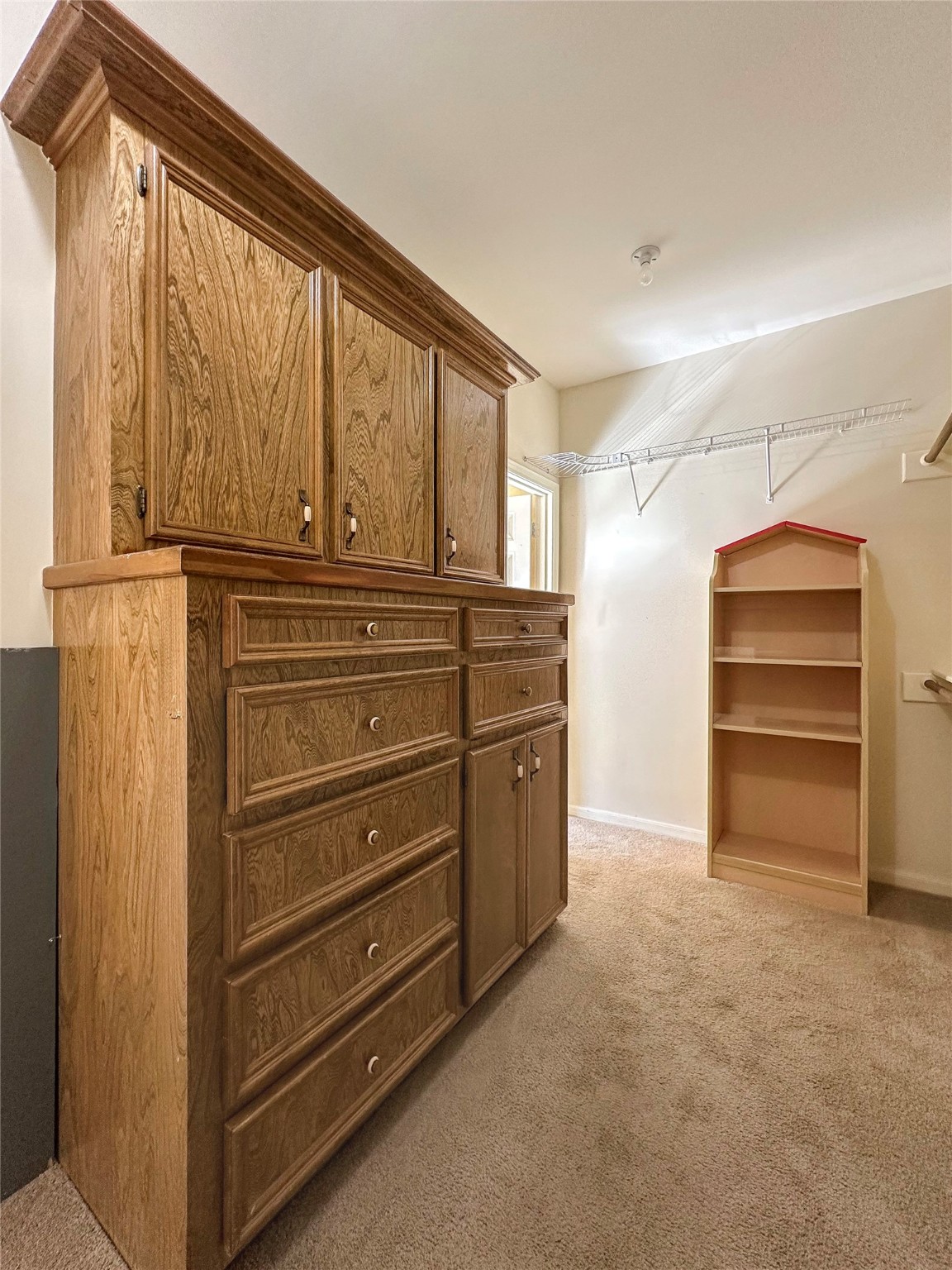 17003 Misty Creek Drive Spring, TX 77379 - Photo 25 of 50 a view of walk in closet with clothes