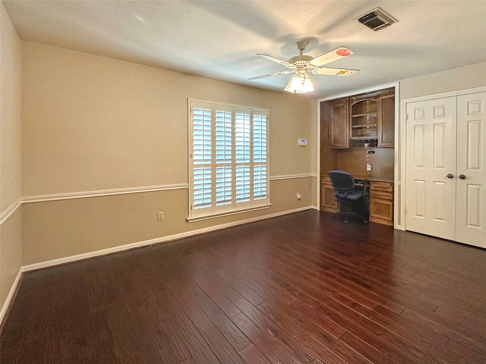 17003 Misty Creek Drive Spring, TX 77379 - Photo 27 of 50 wooden floor in an empty room with a window