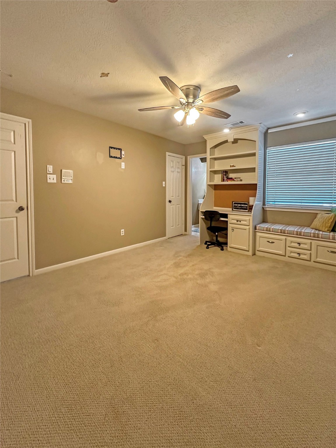 17003 Misty Creek Drive Spring, TX 77379 - Photo 31 of 50 an empty room with furniture and windows