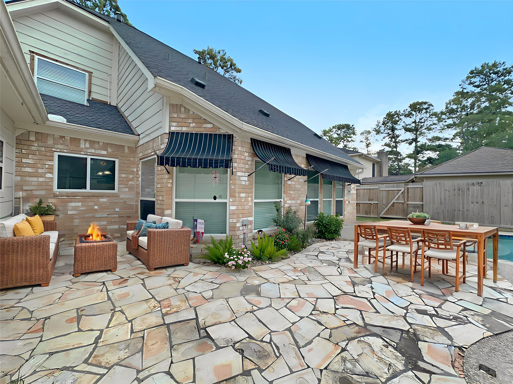 17003 Misty Creek Drive Spring, TX 77379 - Photo 36 of 50 a view of house with patio outdoor seating