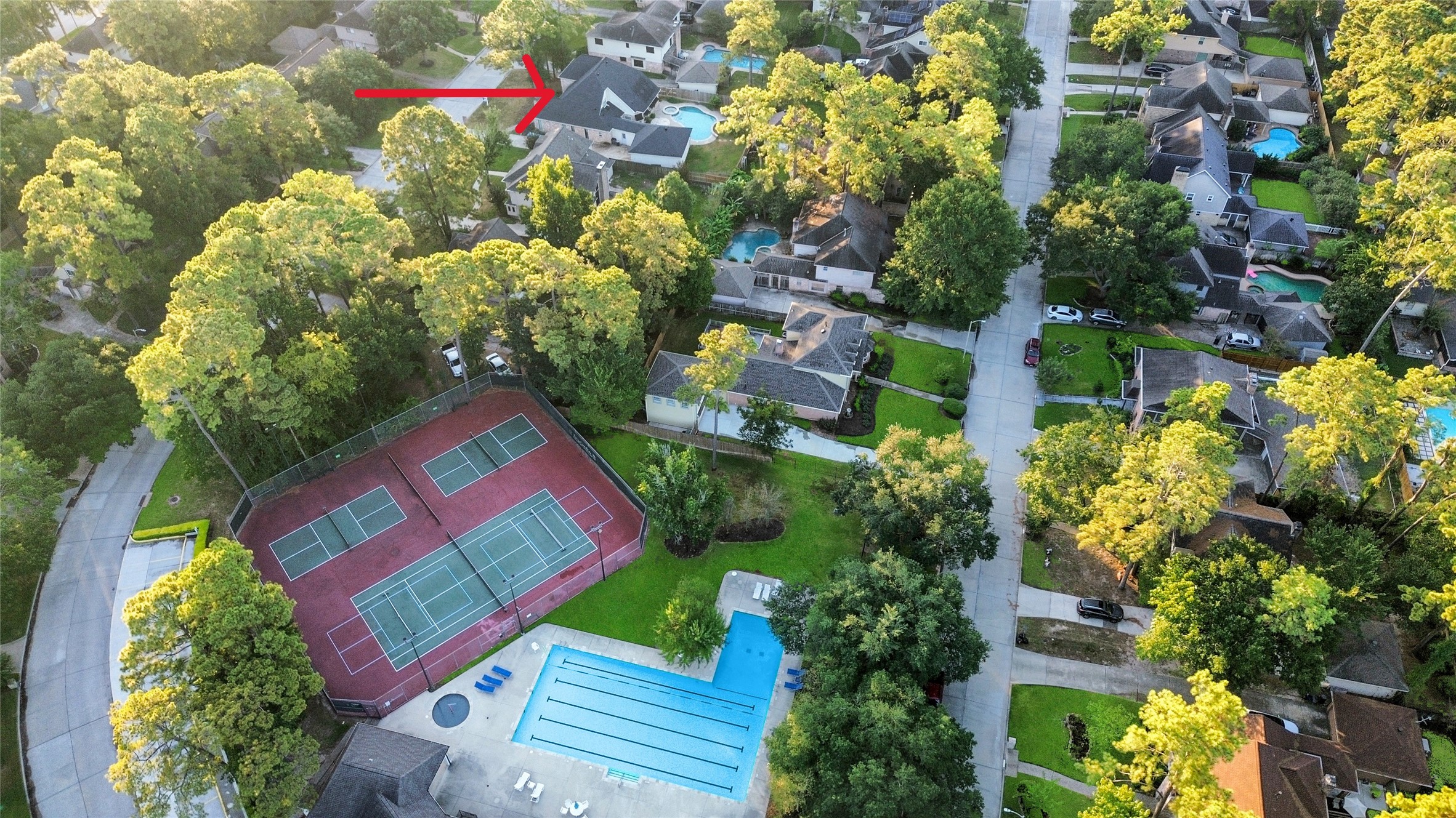 17003 Misty Creek Drive Spring, TX 77379 - Photo 38 of 50 Steps away amenities! Lighted courts, Pool offers lounge areas and Kiddie pool. Clubhouse I is ideal for up to 40 guests- has as a full kitchen, working fireplace along with tables and chairs.