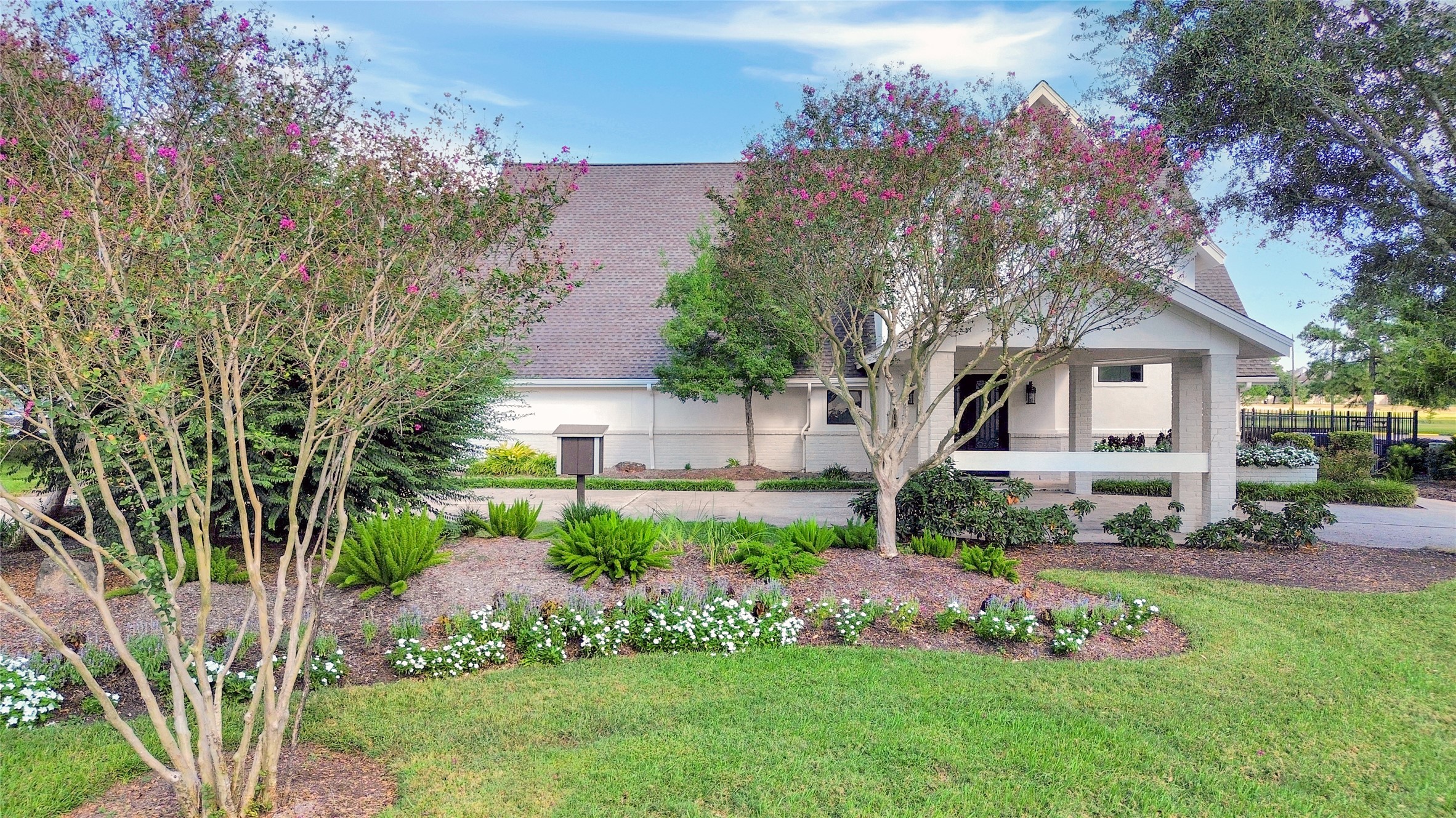 17003 Misty Creek Drive Spring, TX 77379 - Photo 40 of 50 a front view of a house with garden