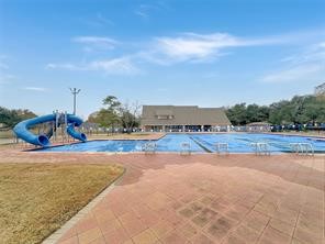 17003 Misty Creek Drive Spring, TX 77379 - Photo 41 of 50 Clubhouse 2 Pool (big pool) located at 6002 Bur Oak Dr., has 9 25-meter lanes, wading/toddler pool, sun-deck, two slides and a deep end. Pools open to SCOCIA Residents and their guests only. Lifeguards on duty