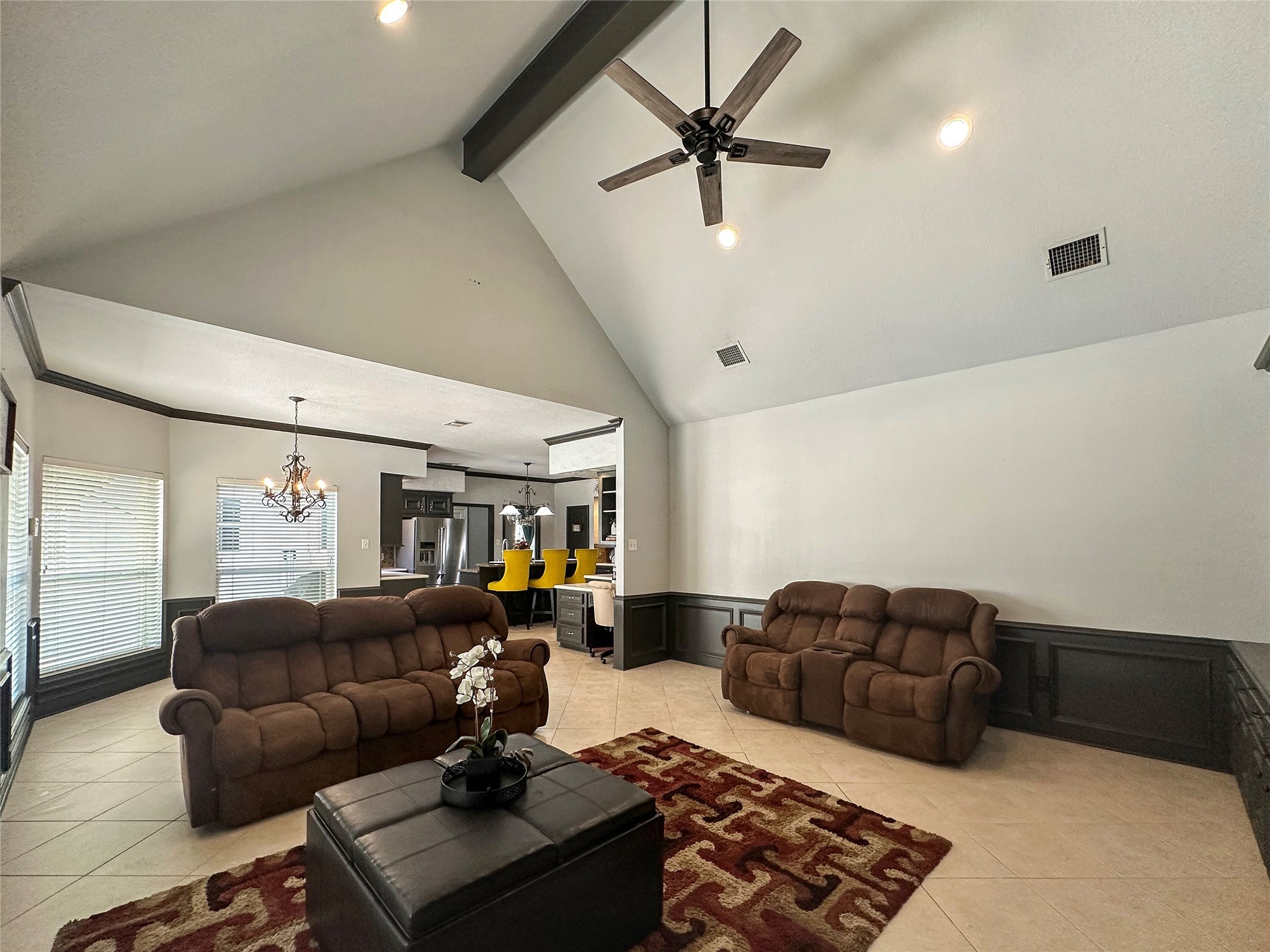 17003 Misty Creek Drive Spring, TX 77379 - Photo 9 of 50 a living room with furniture ceiling fan and a rug