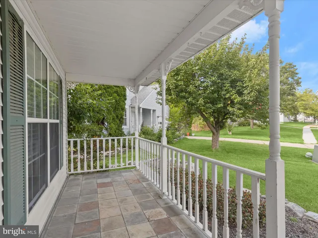 a view of a porch with a yard