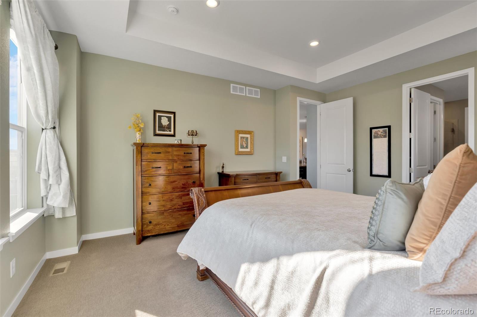 1122 Highpoint Trail Elizabeth, CO 80107 - Photo 25 of 45 a bedroom with a bed and a furniture