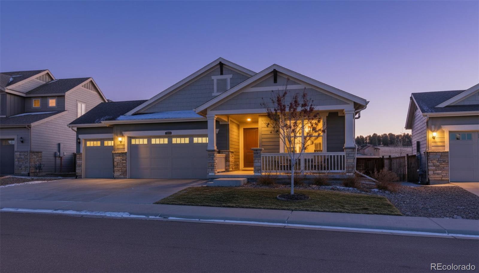 1122 Highpoint Trail Elizabeth, CO 80107 - Photo 3 of 45 a front view of a house with a porch