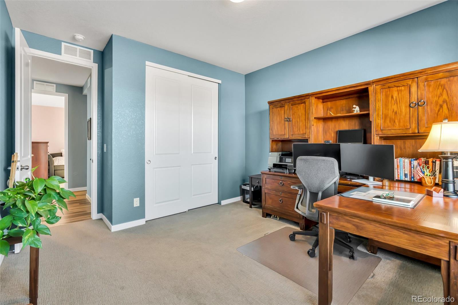 1122 Highpoint Trail Elizabeth, CO 80107 - Photo 31 of 45 a bedroom with furniture and a window