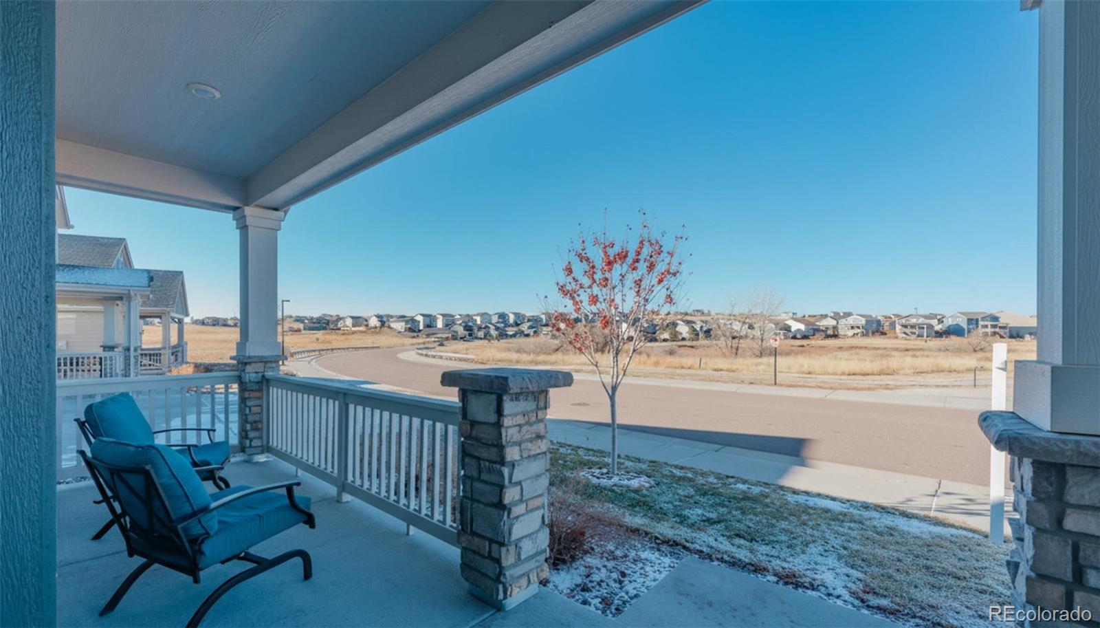 1122 Highpoint Trail Elizabeth, CO 80107 - Photo 4 of 45 a view of a balcony with an ocean