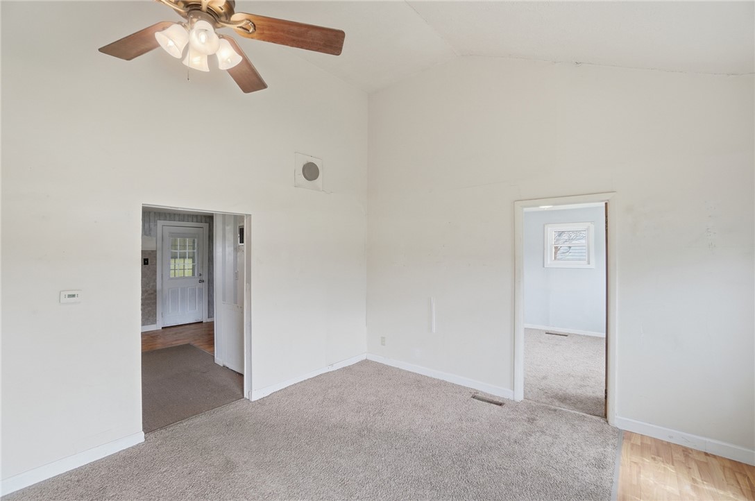 1166 West Sparrow Road Springfield, OH 45502 - Photo 17 of 40 This interior offers a comfortable setting with practical flooring choices and a classic ceiling fan.