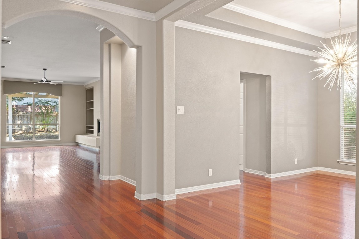 7124 Quimper Lane Austin, TX 78749 - Photo 13 of 40 a view of livingroom with hardwood floor and window