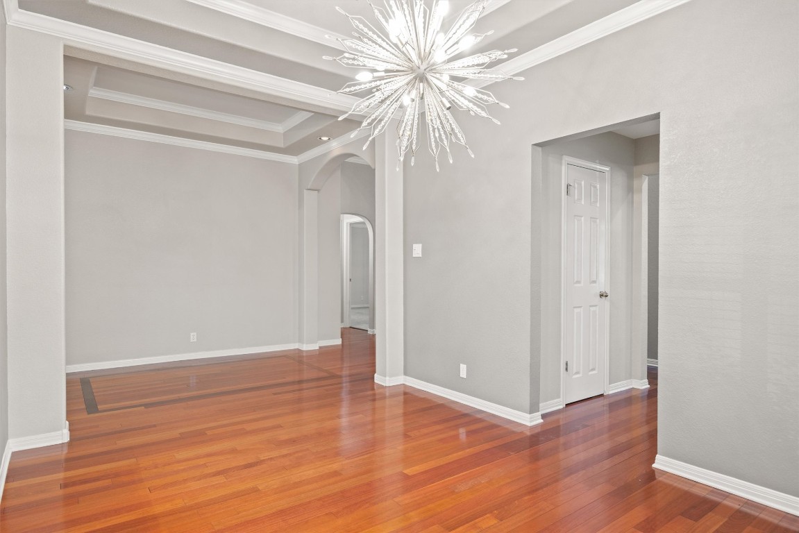 7124 Quimper Lane Austin, TX 78749 - Photo 15 of 40 wooden floor in an empty room with a window
