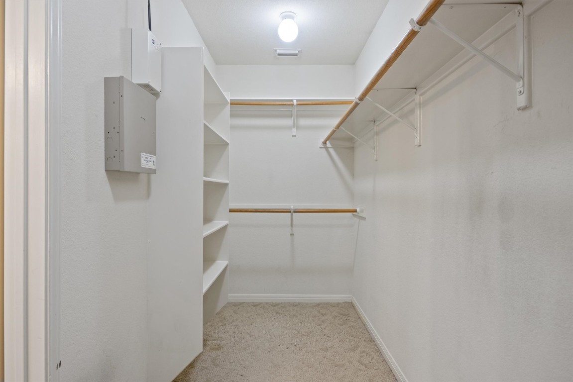 7124 Quimper Lane Austin, TX 78749 - Photo 22 of 40 a view of walk in closet
