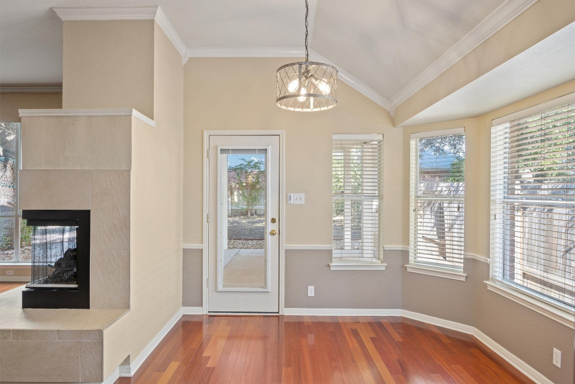 7124 Quimper Lane Austin, TX 78749 - Photo 29 of 40 a view of an room with wooden floor and windows