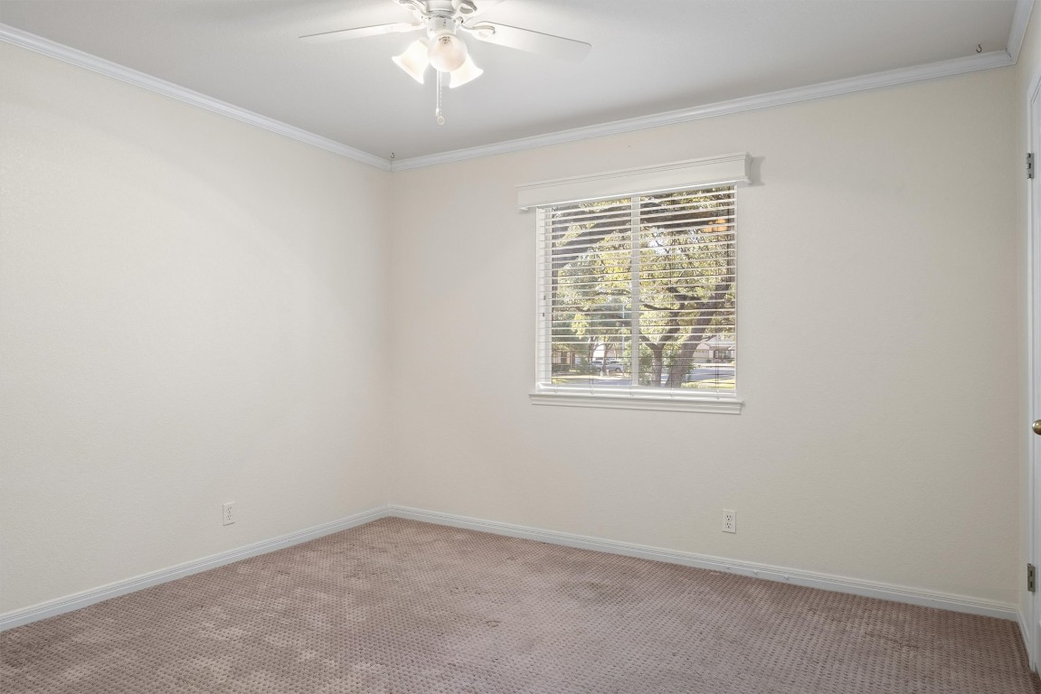 7124 Quimper Lane Austin, TX 78749 - Photo 7 of 40 an empty room with a window