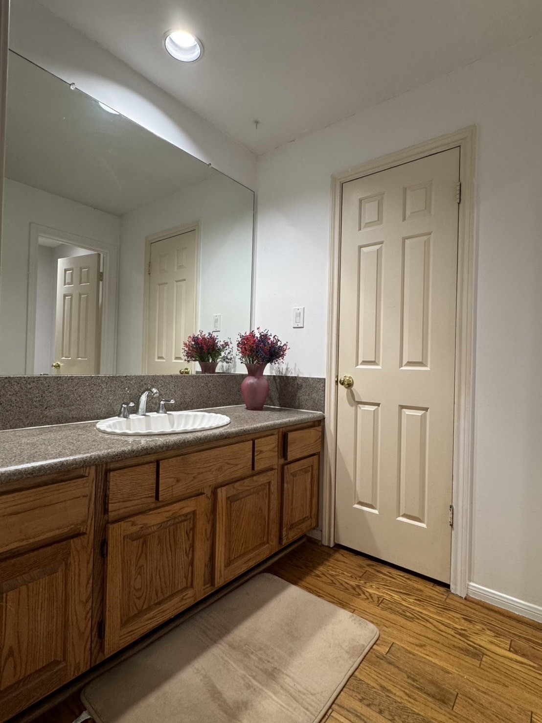 5200 Weslayan Street, Unit 311 Houston, TX 77005 - Photo 14 of 24 a bathroom with a sink and a mirror