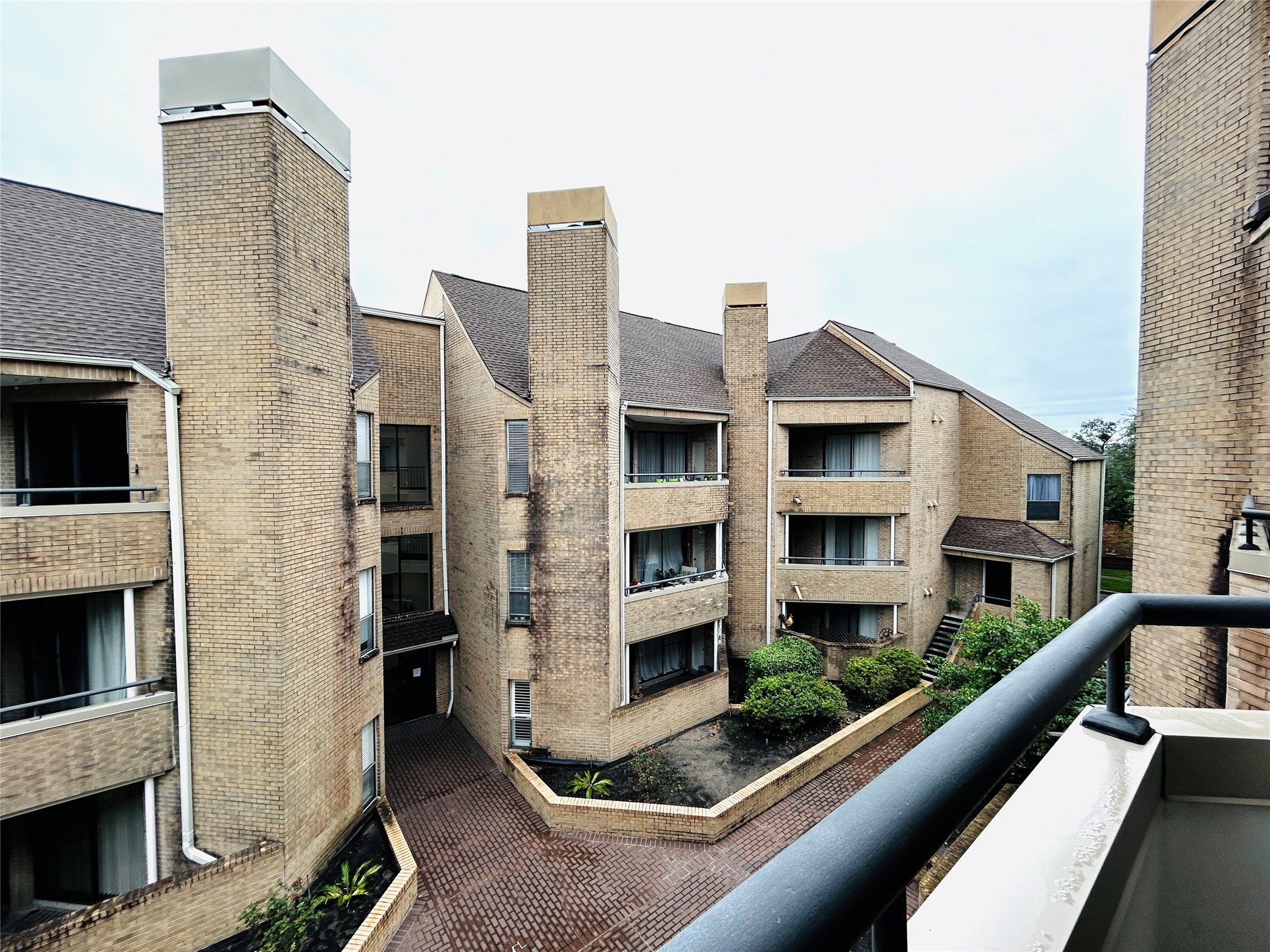 5200 Weslayan Street, Unit 311 Houston, TX 77005 - Photo 20 of 24 a view of balcony with furniture