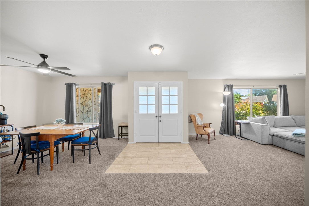 27879 Foxfire Street Menifee, CA 92586 - Photo 8 of 36 a living room with furniture a window and table