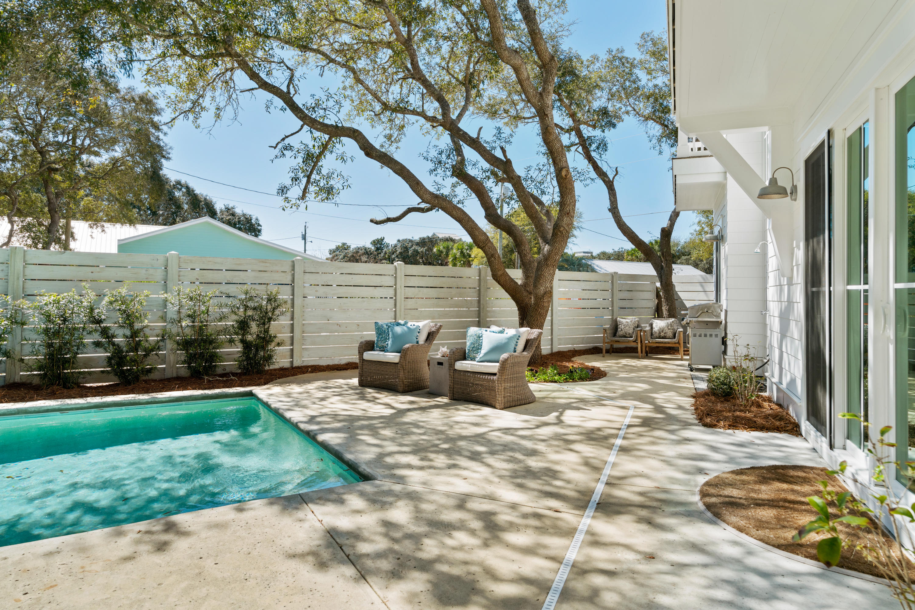 134 Blue Lake Road Santa Rosa Beach, FL 32459 - Photo 22 of 49 a view of a outdoor space with furniture and garden