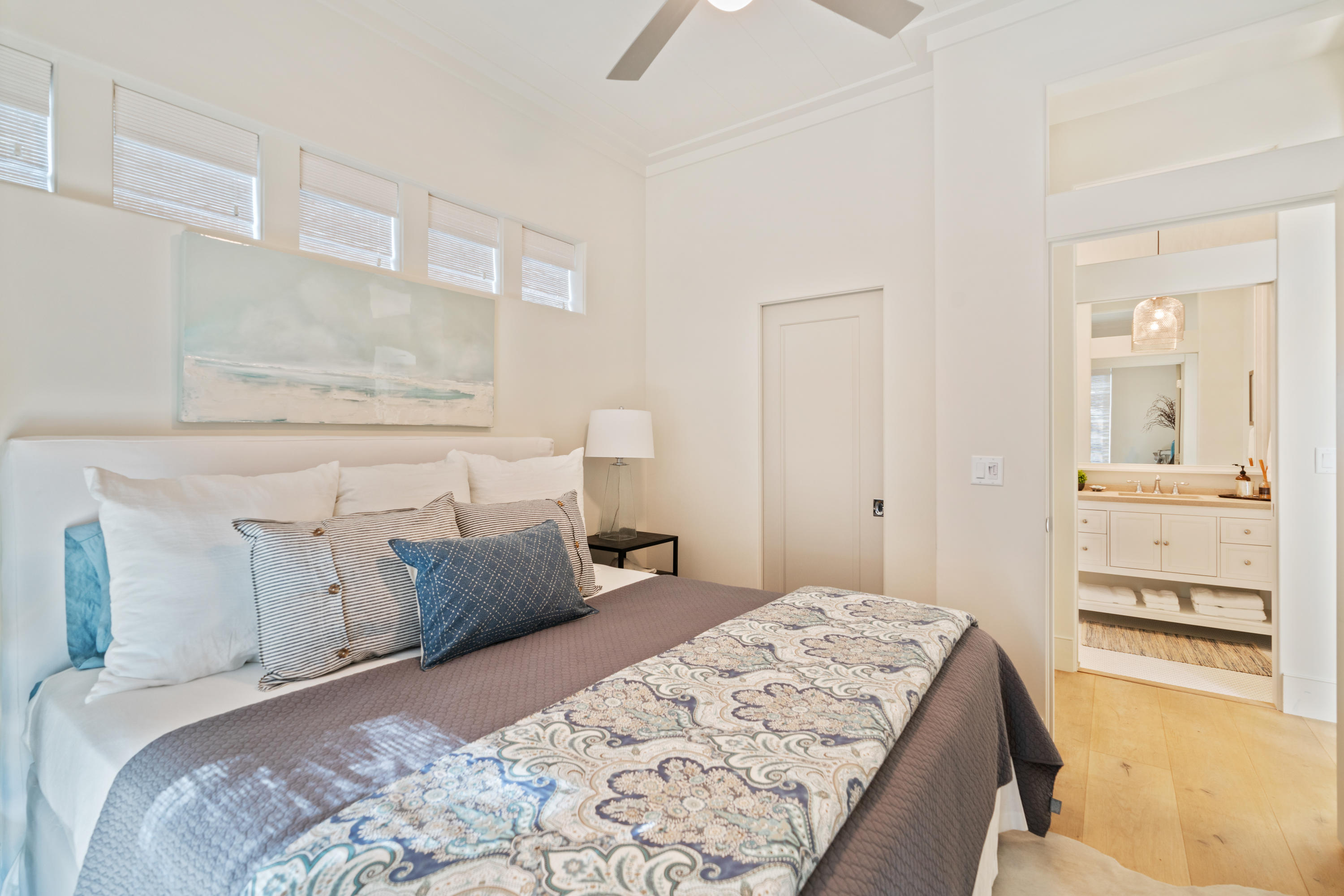 134 Blue Lake Road Santa Rosa Beach, FL 32459 - Photo 25 of 49 a bedroom with a bed and a view of kitchen