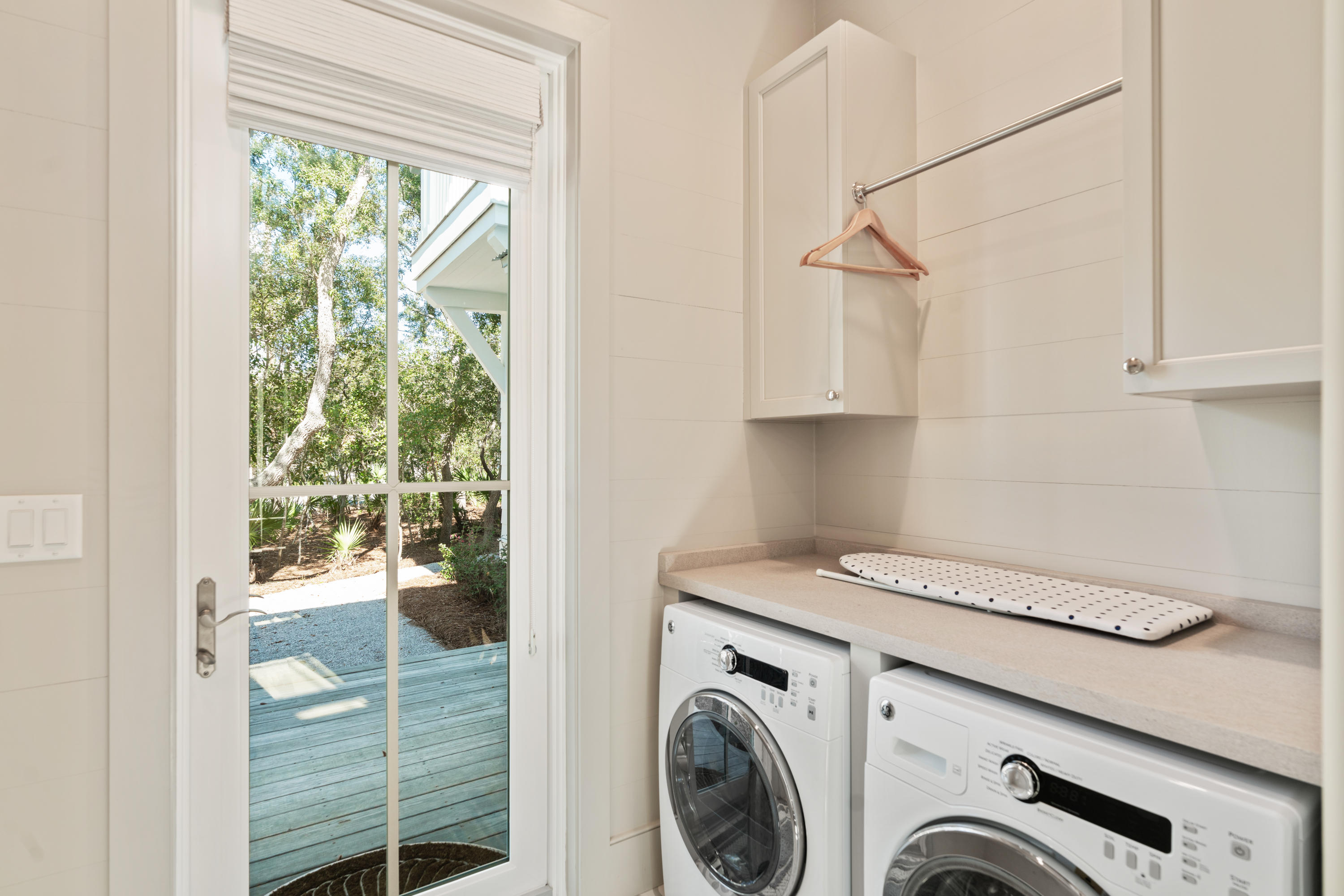 134 Blue Lake Road Santa Rosa Beach, FL 32459 - Photo 43 of 49 a utility room with dryer and washer