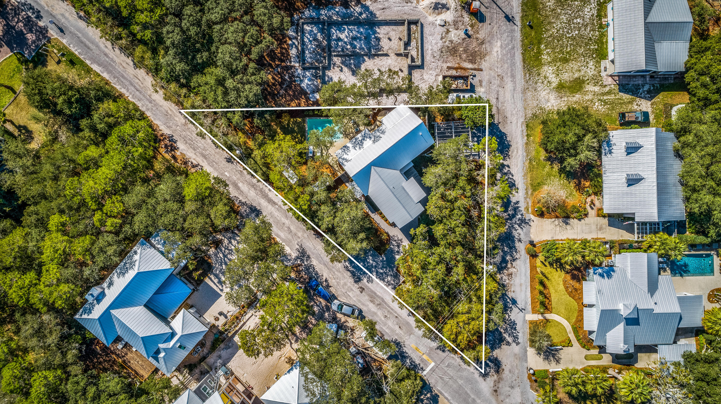 134 Blue Lake Road Santa Rosa Beach, FL 32459 - Photo 44 of 49 an aerial view of a house with a garden