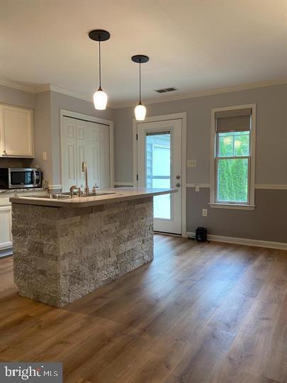 211 Morningside Drive Falling Waters, WV 25419 - Photo 13 of 42 a view of a kitchen with a sink and chandelier