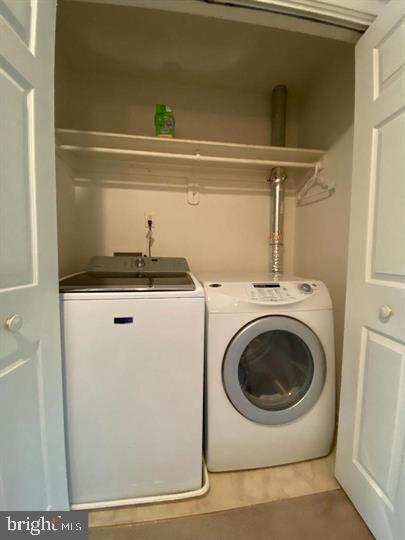 211 Morningside Drive Falling Waters, WV 25419 - Photo 16 of 42 a utility room with dryer and washer