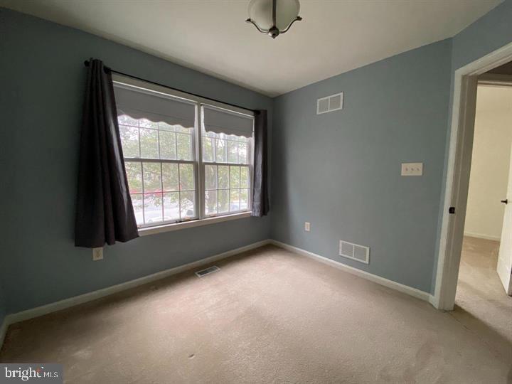 211 Morningside Drive Falling Waters, WV 25419 - Photo 17 of 42 an empty room with windows