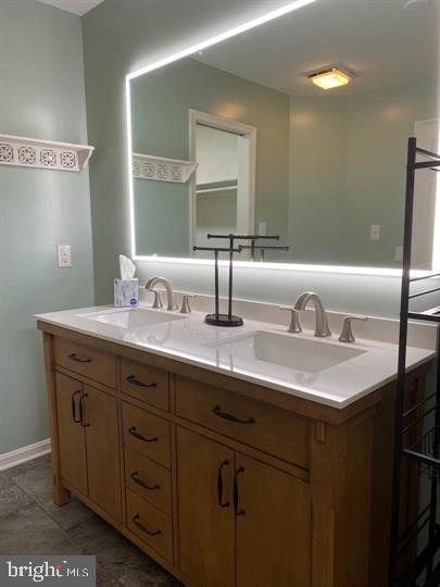 211 Morningside Drive Falling Waters, WV 25419 - Photo 32 of 42 a bathroom with a sink and a mirror
