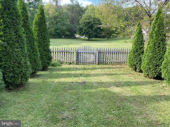 211 Morningside Drive Falling Waters, WV 25419 - Photo 41 of 42 a view of a deck with a yard