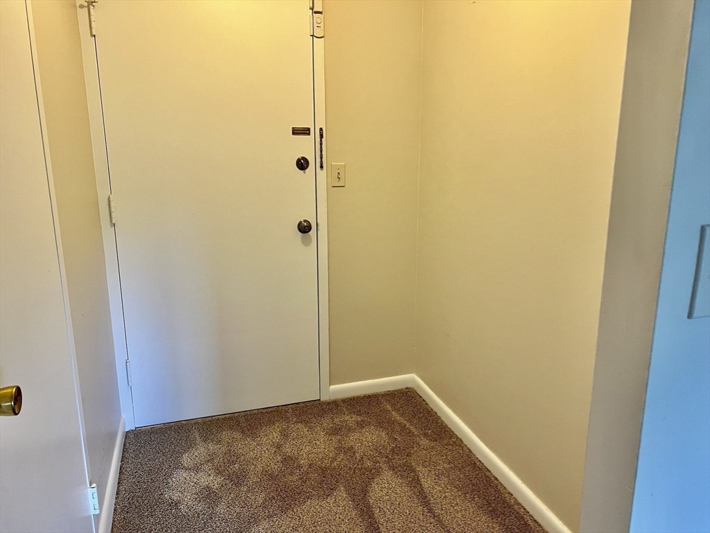 1006 Paradise Road, Unit 3R Swampscott, MA 01907 - Photo 17 of 34 a view of a hallway