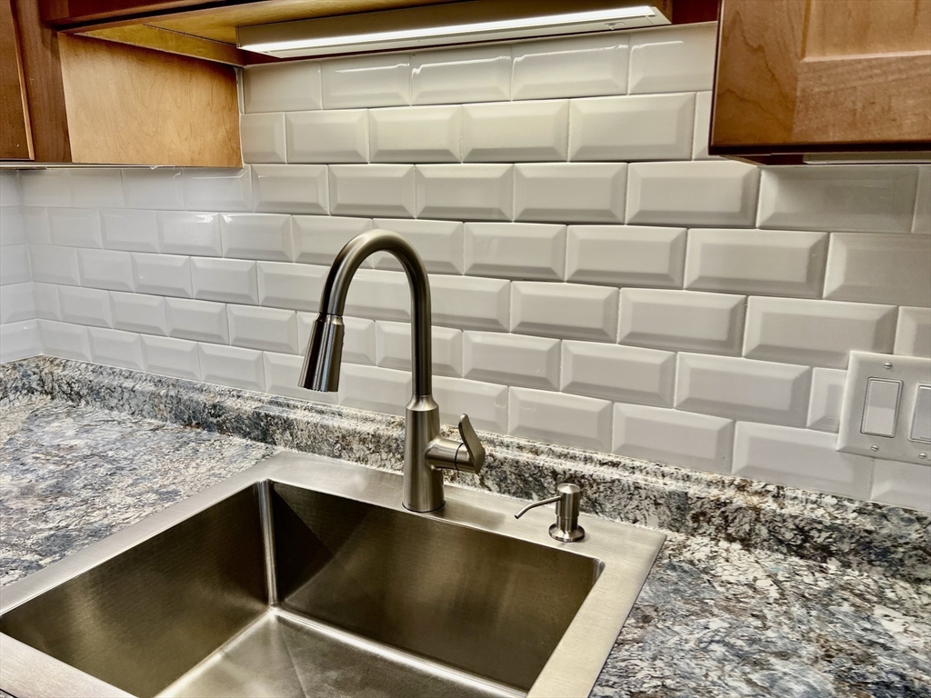 1006 Paradise Road, Unit 3R Swampscott, MA 01907 - Photo 8 of 34 a close view of sink