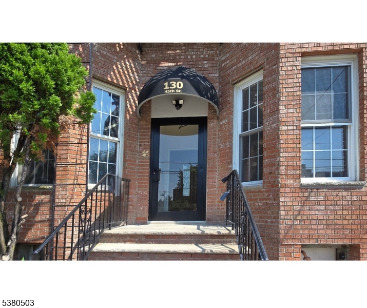 a black and white photo of a house