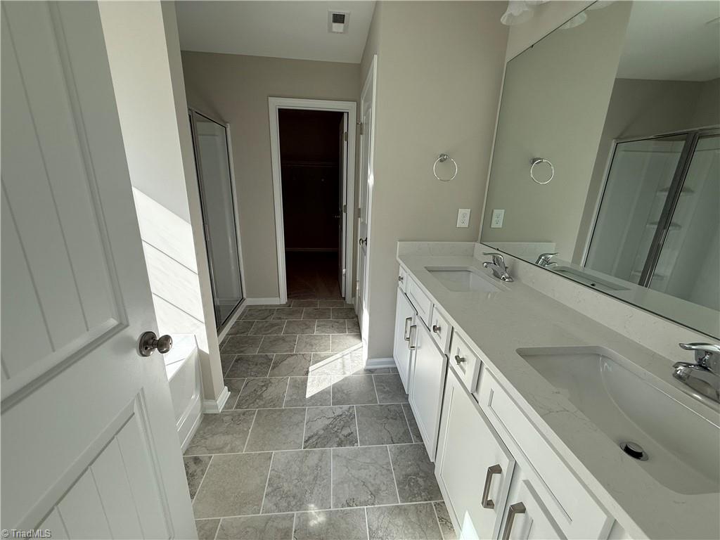 3171 Riley Ford Trail High Point, NC 27265 - Photo 34 of 40 primary bath with tub & shower