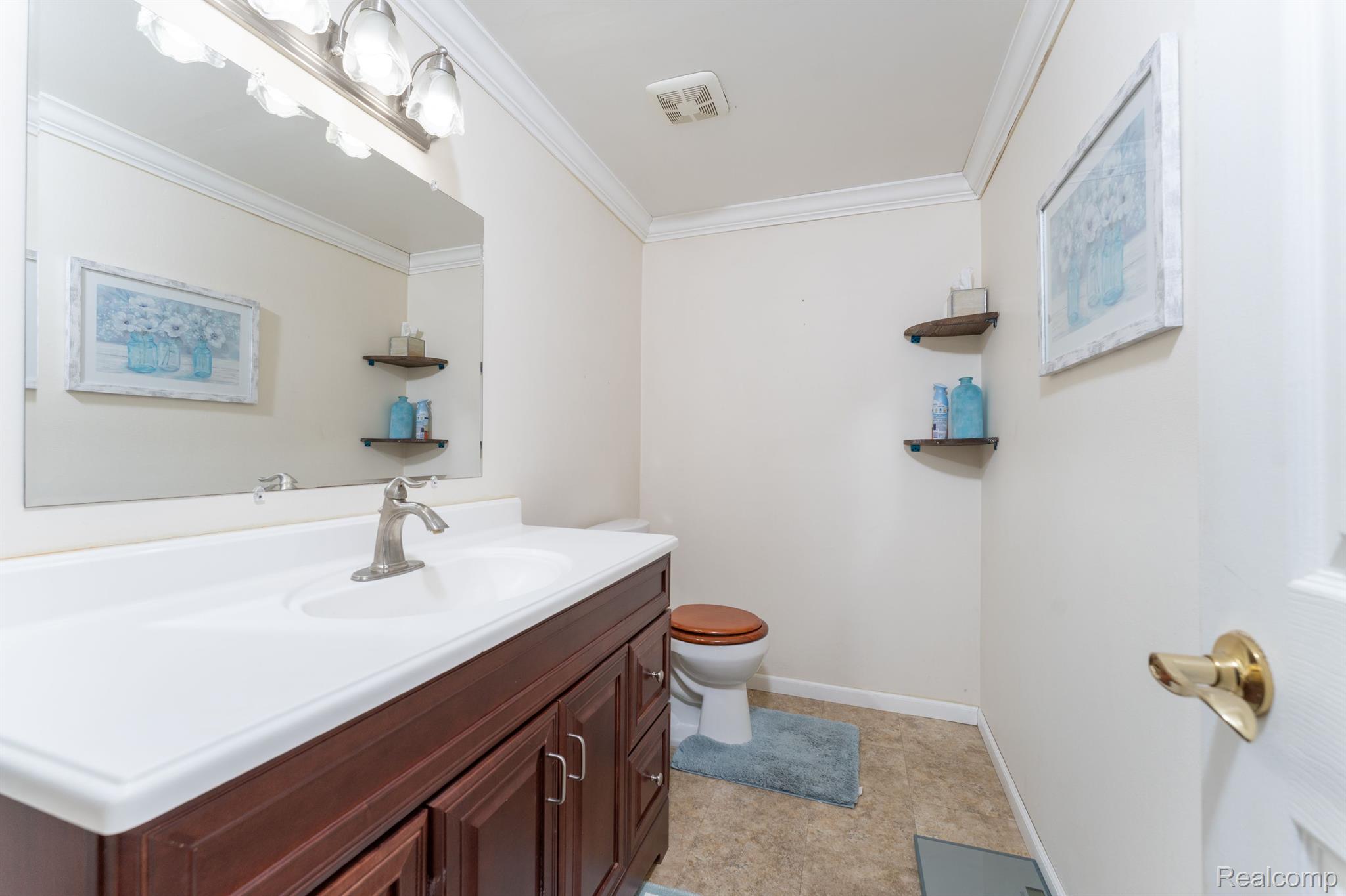 616 Rickett Road, Unit 123 Brighton, MI 48116 - Photo 12 of 21 LARGE 1/2 BATH OFF LIVING ROOM