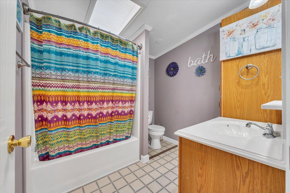 627-641 Novelty Road Penhook, VA 24137 - Photo 36 of 69 a bathroom with a sink and a window