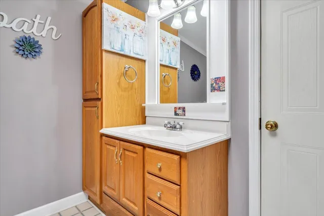 a view of a hallway with a chandelier